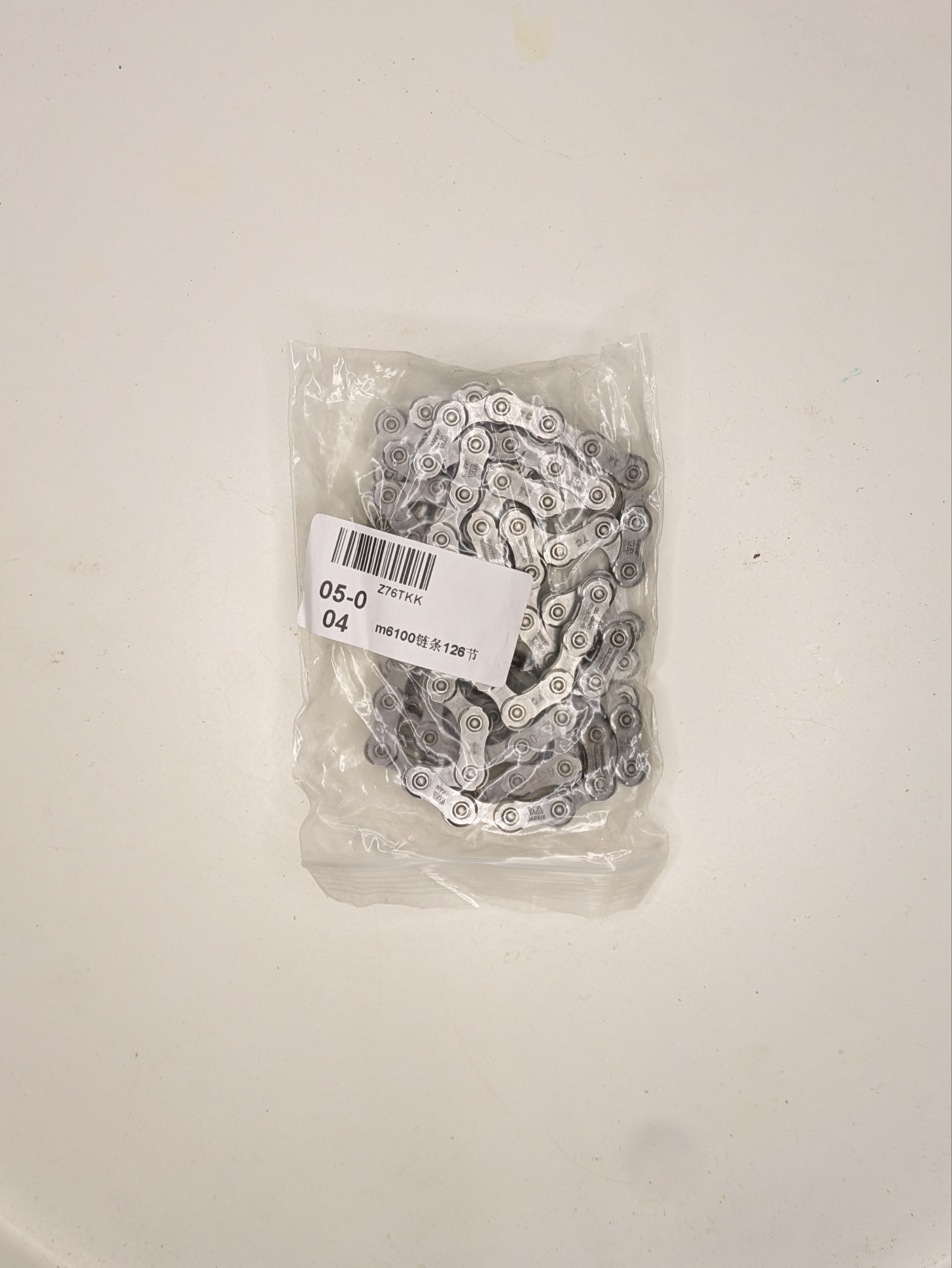 Цепь Shimano M6100 на 12ск